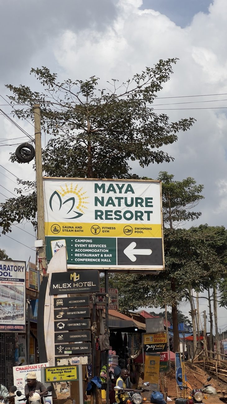 The Maya Nature Resort road sign marking the turn off the main road.