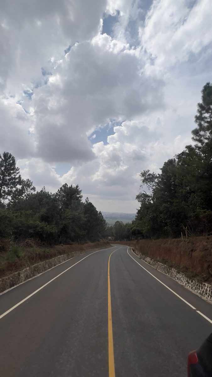 The scenic road descending toward the valley near Maya Nature Resort.
