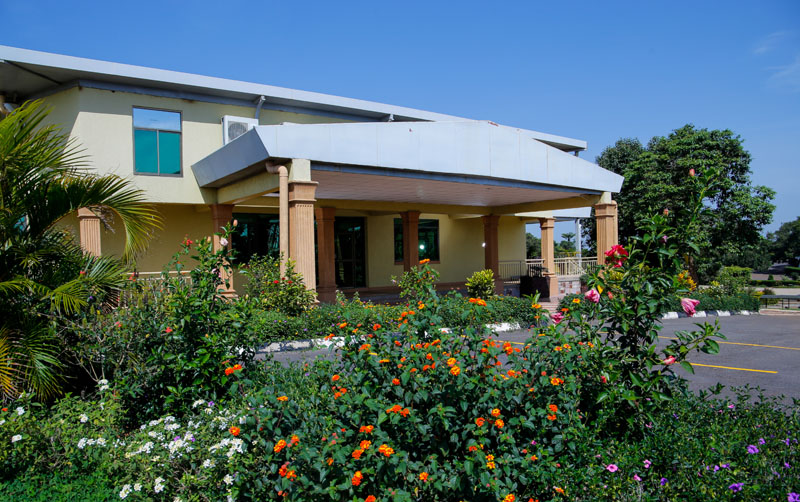 Gardens & buildings at Maya Nature Resort.