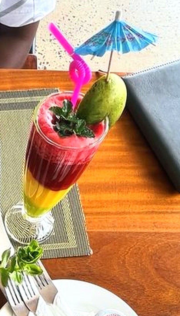 Freshly made layered fruit juice at Maya Nature Resort