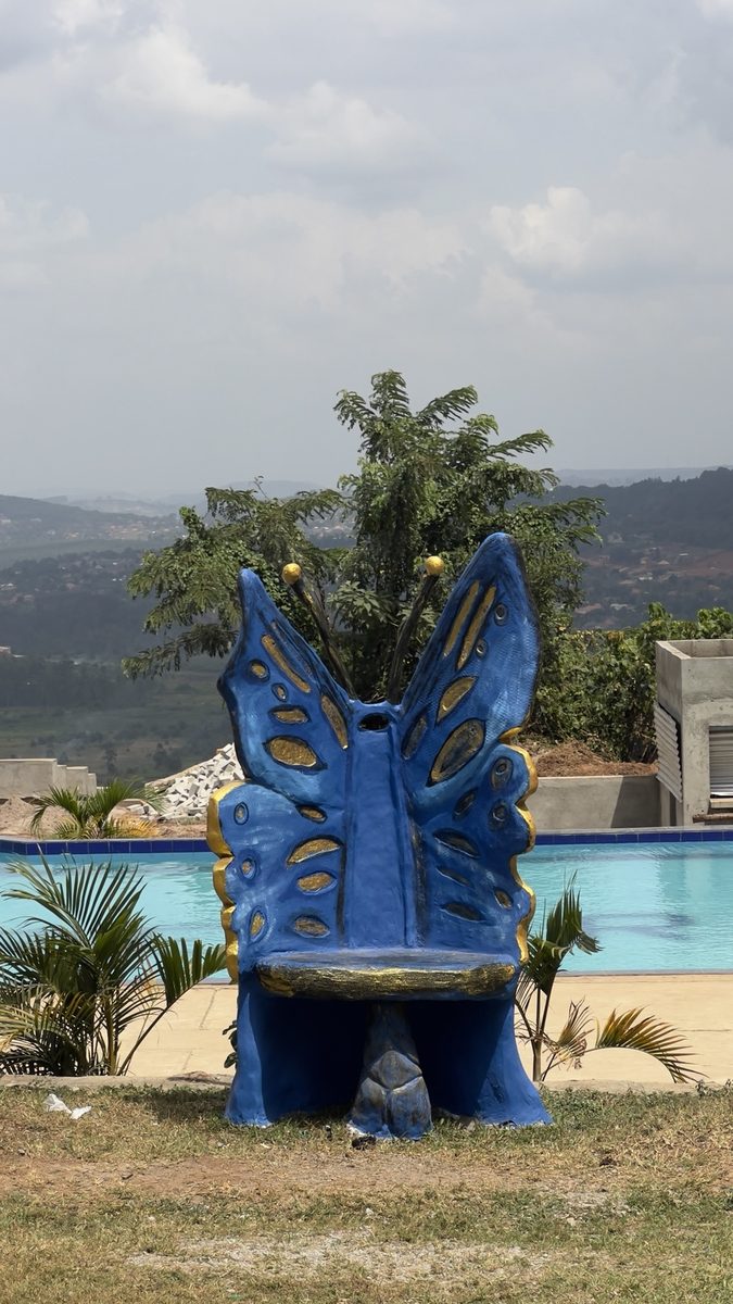 The blue butterfly photo seat beside the swimming pool at Maya Nature Resort.